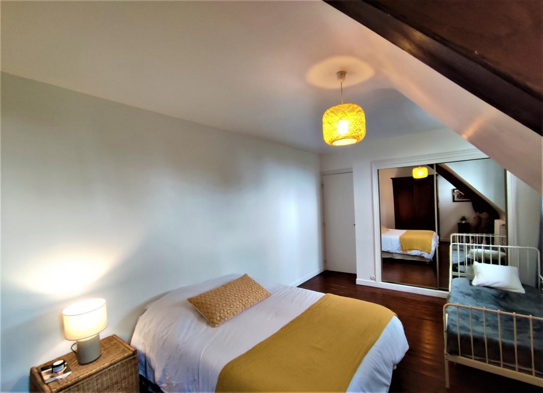 Upstairs double bedroom with floral textiles